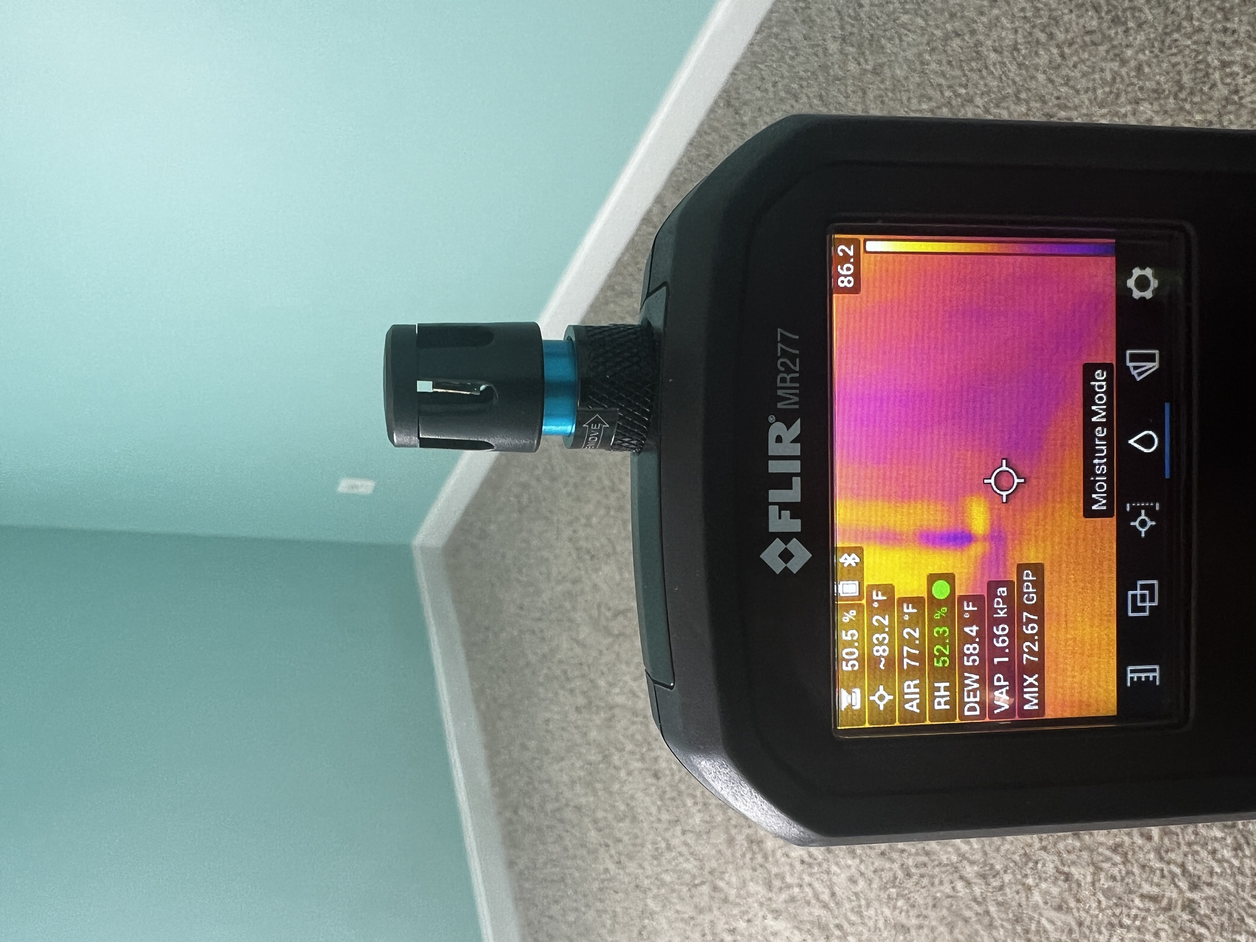 Infrared moisture scan identifying potential wet areas inside wall